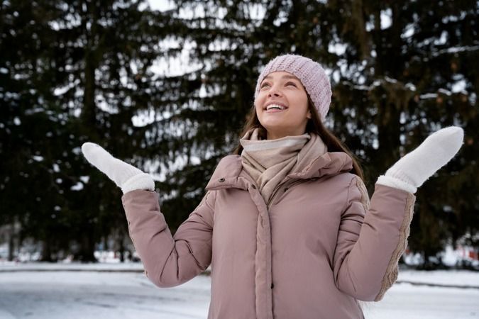 1667942095-medium-shot-smiley-woman-winter-time.jpg